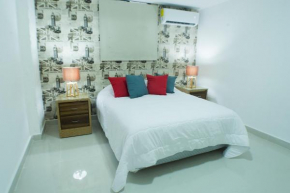 Malecon Premium Rooms & Hotel